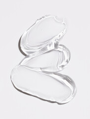 cosmetic smears cream gel texture on a light background