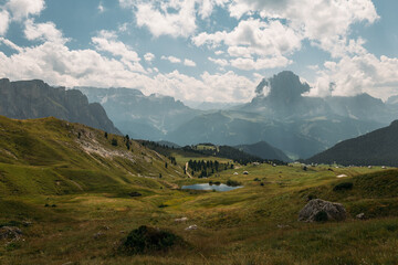 Breathtaking and stunning Dolomites landscape observed beneath a captivating, cloudy sky filled...