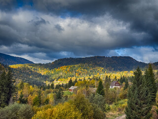 Obraz premium The landscape of Carpathian Mountains in the cloudy weather. Perfect weather condition in the autumn season