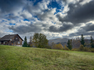 Obraz premium The landscape of Carpathian Mountains in the cloudy weather. Perfect weather condition in the autumn season