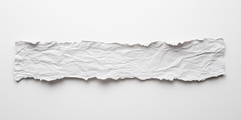 Obraz premium Crumpled torn strip of white paper with jagged edges, isolated on a plain light background, perfect for abstract creative designs or textured placeholders