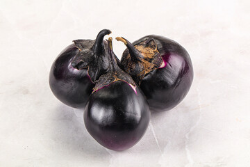 Raw violet and black eggplant