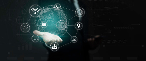 Businessman holding globe with network connecting data of digital technology, cloud computing and ai artificial intelligence develop smart information transformant and global business development.
