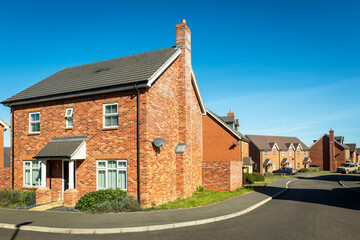traditional detached house within residential estate in England UK