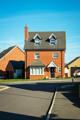 traditional detached house within residential estate in England UK