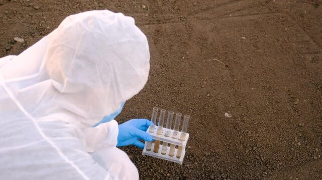 Taking soil samples in nature. Selective focus.