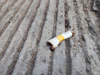 cigarette on the ground
