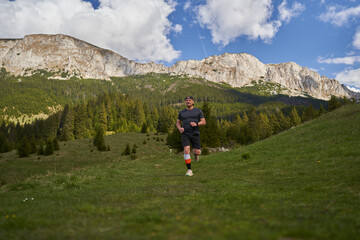 Trail runner running in the mountains