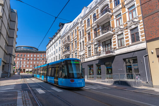 View of architecture and city tram on Dokkveien, Aker Brygge, Oslo, Norway, Scandinavia, Europe