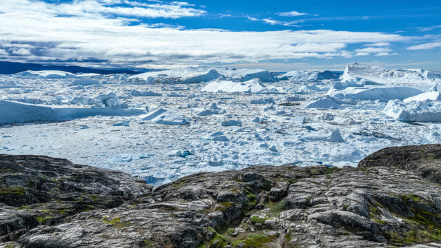 Aerial of the Ilulissat Icefjord, UNESCO World Heritage Site, Western Greenland, Denmark, Polar Regions - Powered by Adobe