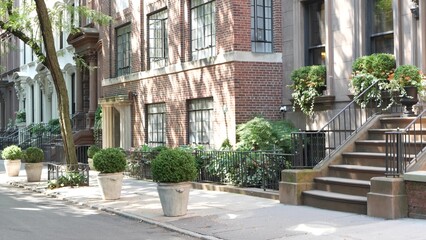 New York City townhouse building, Brooklyn Heights residential district, USA. Brownstone urban...