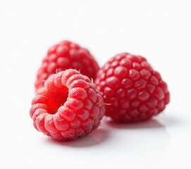 raspberries close up on white background