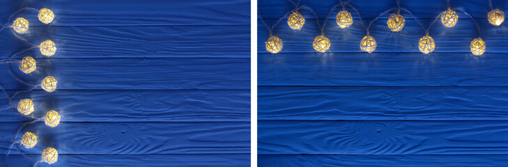 christmas garland lights on blue wooden background with copy space for your text. Top view