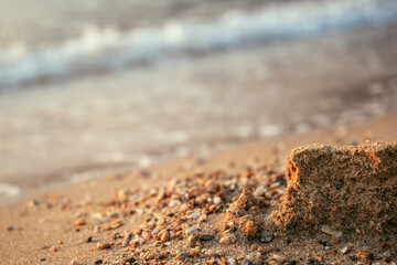 Ruined sand castle at the seaside beach