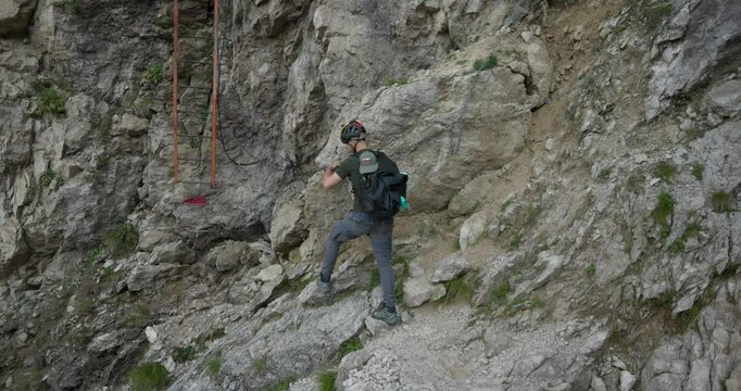 Male Hiking Rocky Slopes Of Grignetta Mountain In Valsassina, Italy - Wide Shot