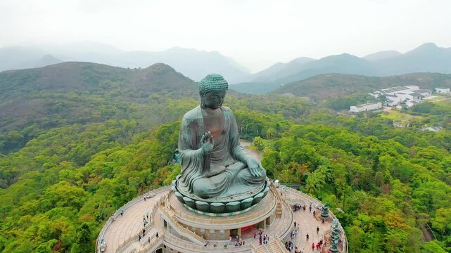 Tian Tan Buddha-Big Buddha Hong Kong aerial bumerang shot.