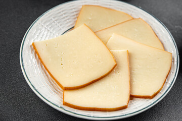 Raclette cheese tasty food dish fresh delicious gourmet food background on the table rustic food top view copy space top view
