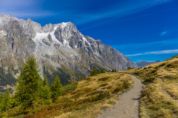 Chamonix rocky granite mountain peaks in french Alps around Mont Blanc summit in Chamonix valley. Scenic landscape of iconic alpine summits the legends of mountaineering and alpinism