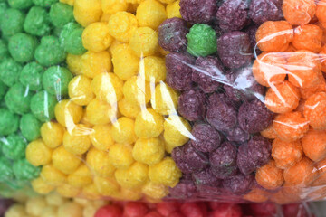 bag of multicolored candy is full
