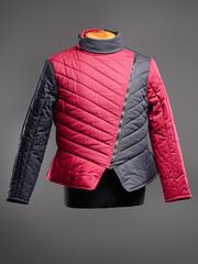 Historical fashion. Medieval knight cloth. Padded jacket gambeson.