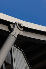 Close up detail of Steel structure hinges and pin connection joint on modern building.