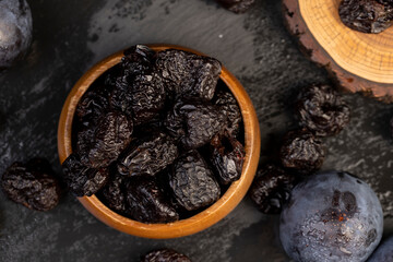 ripe purple plums and dried plums