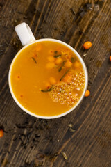 green hot tea with sea buckthorn and orange