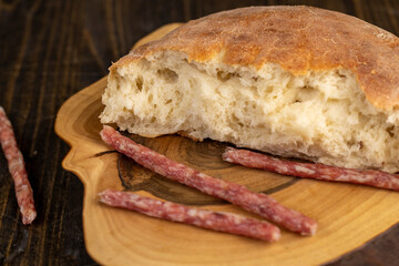 homemade wheat tortilla on the table with pieces of meat