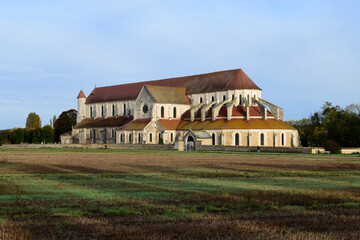 Fototapeta premium Abbey of Pontigny, France, seen from surrounding argicultural field