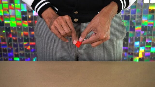 Video shot of the building block heart shaped couple keychains