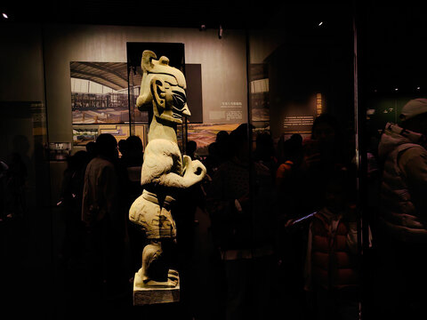 Chengdu, China - October 26, 2024: Masks and sculptures in the mysterious Sanxingdui culture. People are visiting. An archaeological site known for the discovery of aliens and an important Bronze Age 