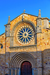 Ancient stone facade and skylight of the Parish of St. Peter the Apostle, Avila, Spain