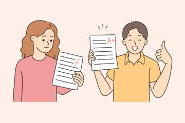 Different grades for school exams for boy and girl showing paper with test grade A or F