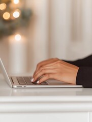person typing on a laptop