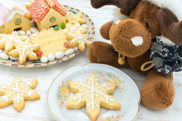 Fototapeta premium Plate with sugar icing Christmas cookies: one with 