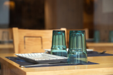 overturned glasses on the restaurant table