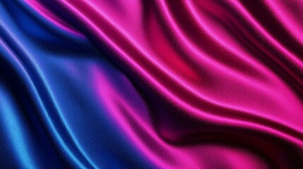 Vibrant and luxurious silk fabric in rich blue and magenta hues perfect for elegant fashion and home decor designs