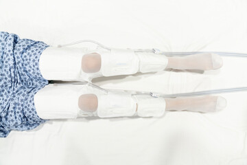 After surgery, pregnancy or varicose veins the patient is dressed in compression stockings by the...