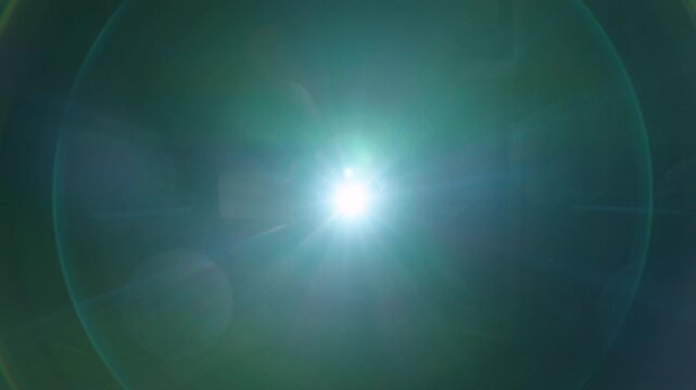 The video projector lights up and dazzles us with cold-coloured flashes of light