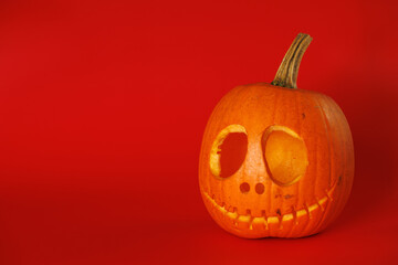 Empty Pumpkin head on red background. Halloween holiday concept.