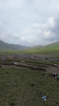 aerial view of the Bromo mountains with green grasslands