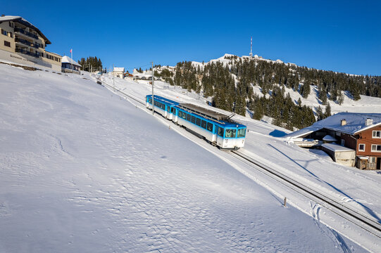 blue vitznau rigibahn train at rigi staffel