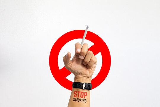 Smoking lifestyle concept with a close-up of a cigarette in hand, symbolizing health hazards, nicotine addiction, and the urgency of quitting smoking for better health.