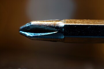 close-up of Philips screwdriver head on soft focused background