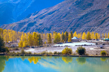 Autumn landscape with lake. Sissu is a small town in India's Lahaul Valley of Himachal Pradesh. It is around 40 km from Manali and located on the right bank of the Chandrabhaga River.