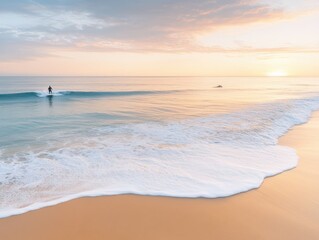 Obraz premium A serene beach at sunset with gentle waves, creating a peaceful and inviting atmosphere for relaxation and enjoyment.