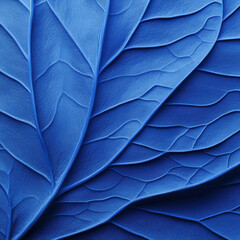 Obraz premium A close-up of textured leaves displaying a rich blue color, highlighting intricate veins and shapes.