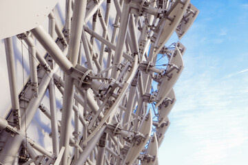 Detailed view of a modern architectural structure showcasing intricate metal frameworks against a...