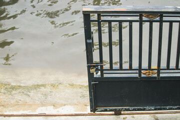 House fence with flooded road