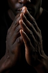 Black hand praying finger adult skin.